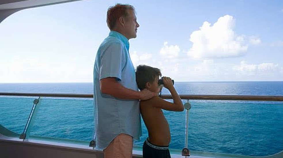 Man and boy on cruise ship